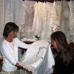 Lace shop Burano - lace makers
Burano - Una signora acquista una tovaglia di merletto in un negozio di Burano Burano - lace makers